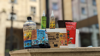  Green Oil Eco Rider Deluxe Set arranged on a yellow brick wall. The products have bright colourful labels: red, green and yellow.