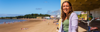 Image of a Sustrans staff member, Hayley, with her e-bike on Barry Island.
